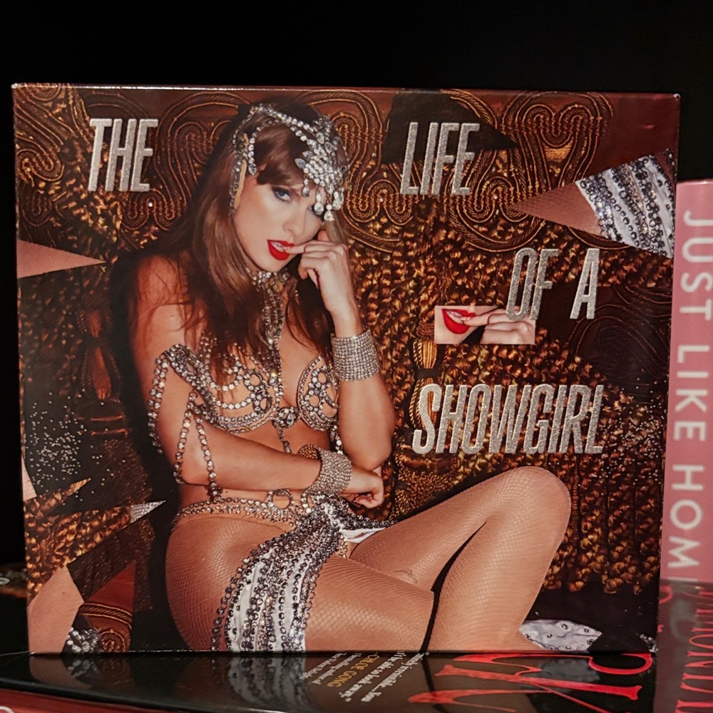 The Life of a Showgirl cd and opalite bracelet. Cd still sealed